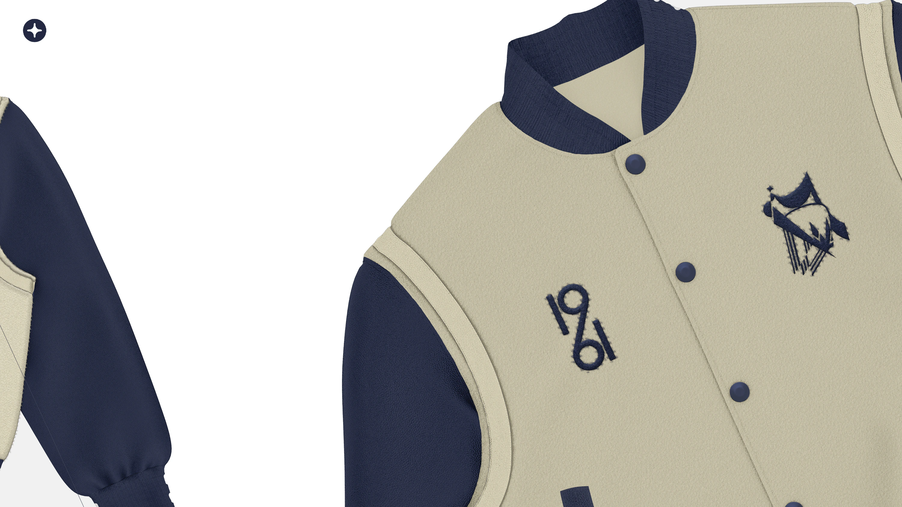 Close-up mockup of a cream varsity jacket chest, showing navy emblem placement and snap fasteners.